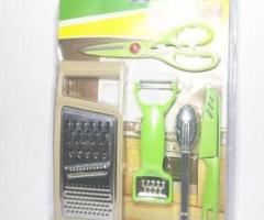 GREEN KITCHENWARE SET WITH A GRATER.