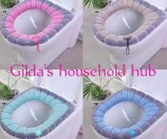 Toilet seat covers with handle